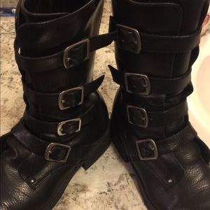 Black combat style boots.